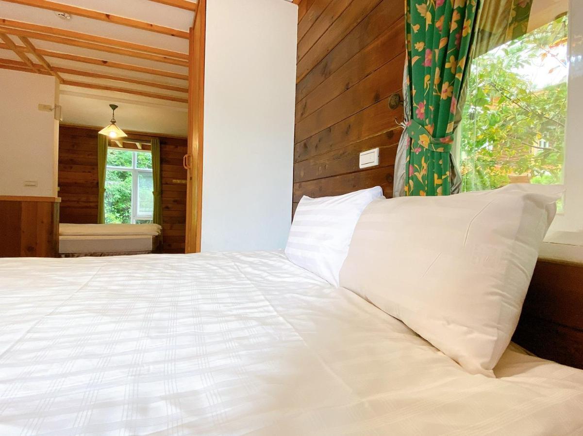 Ailiga Travel Villa Ren'ai Quarto foto