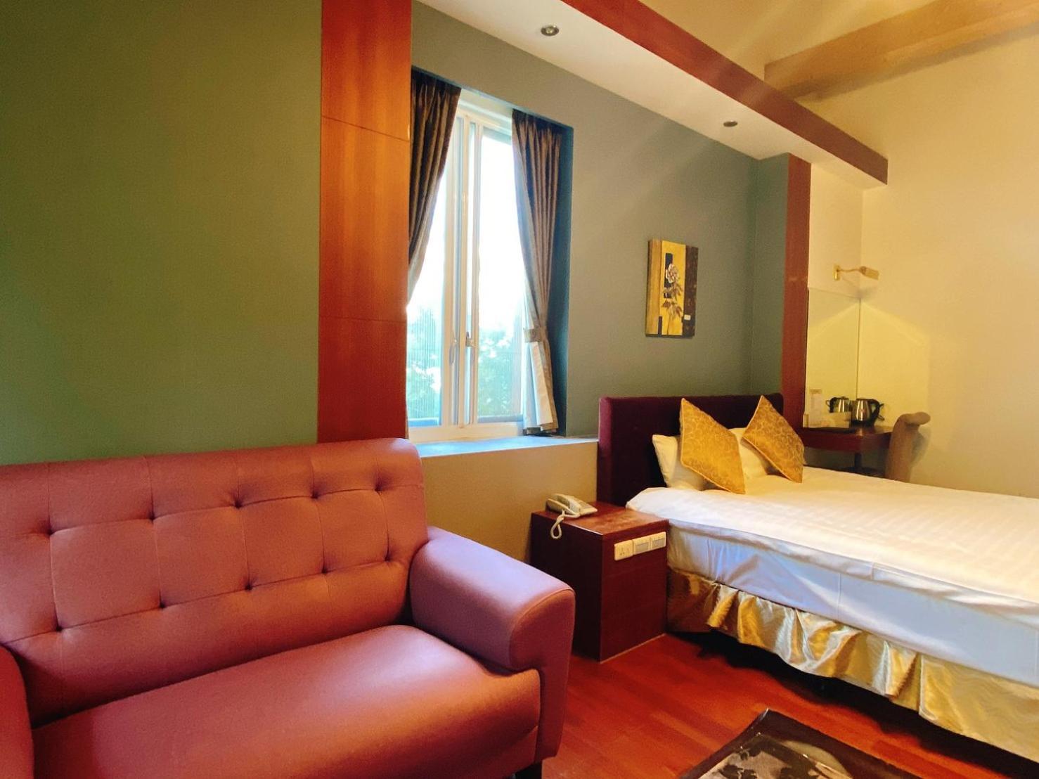 Ailiga Travel Villa Ren'ai Quarto foto