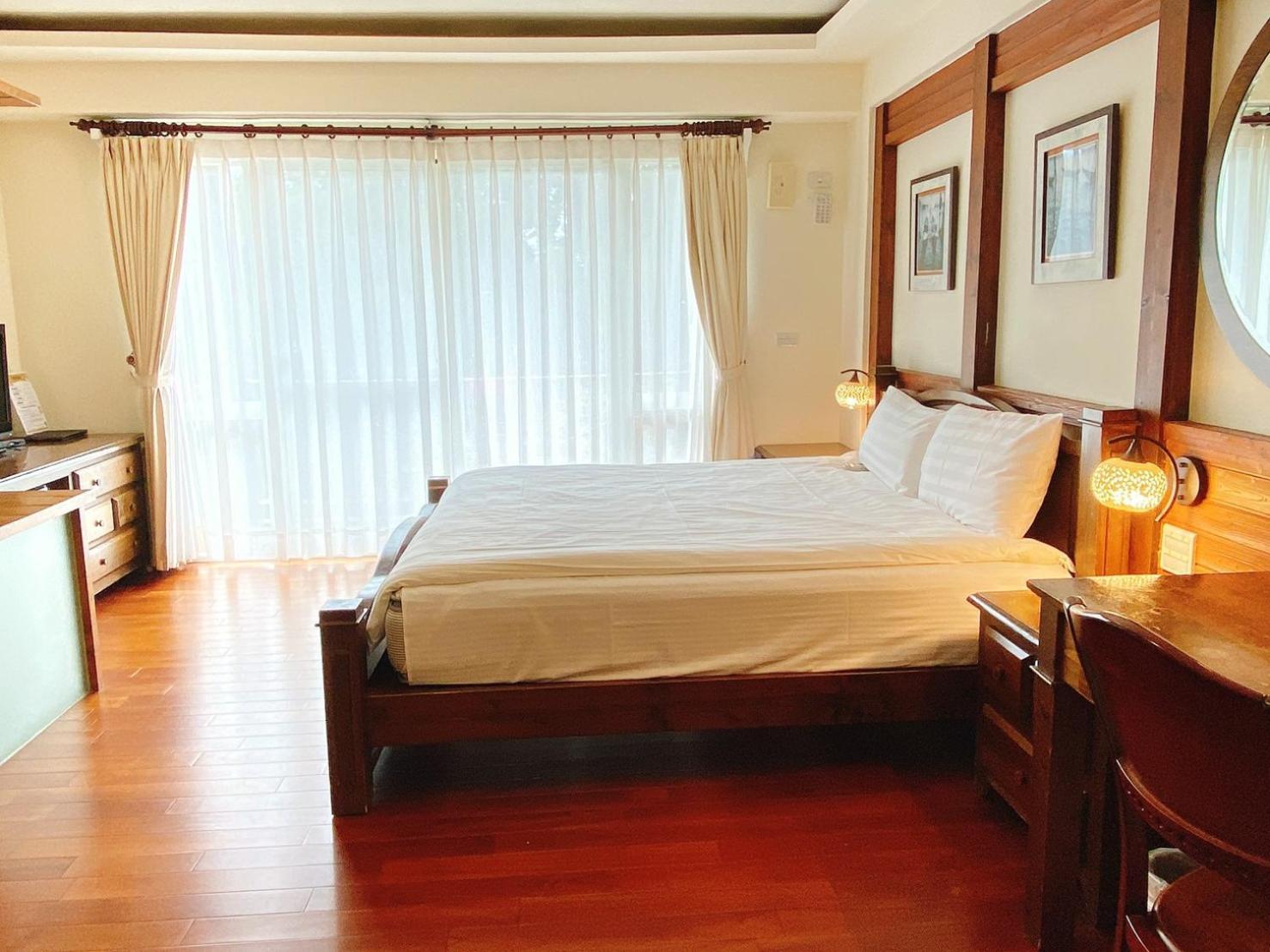 Ailiga Travel Villa Ren'ai Quarto foto
